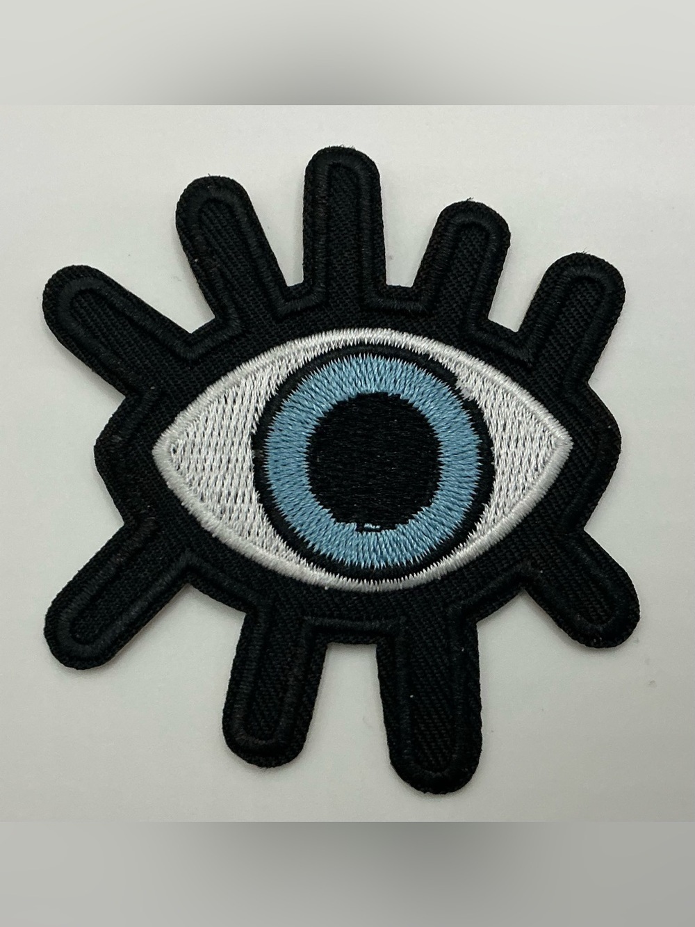 IRON OR SEW ON EMBROIDERED BLUE BLACK EYE WITH LASHES PATCH